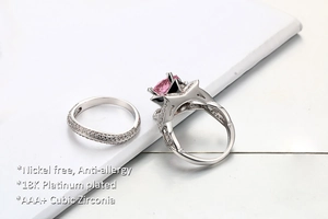 Detail of pink square-cut zirconia double layer ring set with 18K platinum plating