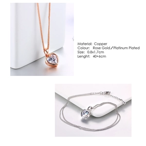 Detail view of heart pendant necklace in rose gold and platinum with zircon insets