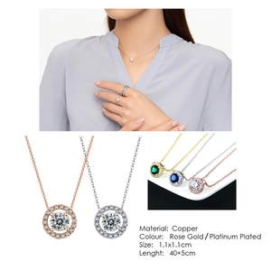 Detail view of copper halo necklace and ring set with rose gold and platinum plating