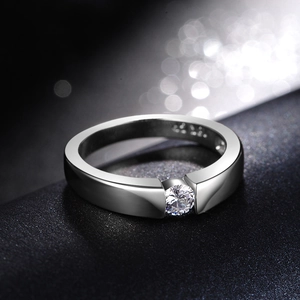 Polished S925 silver ring featuring a round solitaire diamond in a modern tension setting