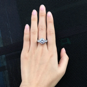 Exquisite silver-plated ring with large round AAA zircon and multi-row pave setting
