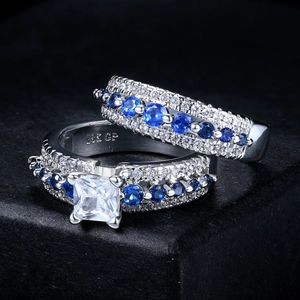 Elegant 18K silver plated ring set featuring square blue zircon and pavé crystals