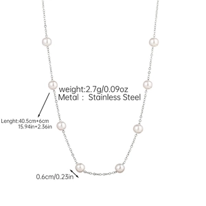 Detalle de las dimensiones del collar de acero y perla con diámetro de 0,6 cm aquí
