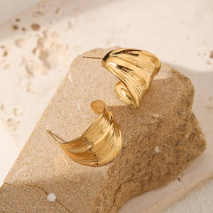 Vintage irregular hammered texture gold plated earrings with a wave pattern for women
