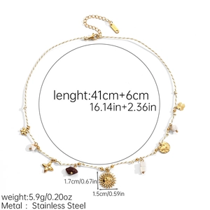 Detail of bohemian woven rope necklace with stainless steel starfish and sun charms