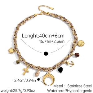 Detail of bohemian woven necklace with stainless steel sun and heart charms