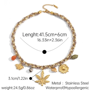 Detail of woven rope necklace with stainless steel bee and flower charms and pebbles