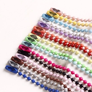 Close-up of vibrant multicolored painted metal ball chains for DIY jewelry making