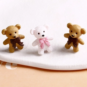 Detailed view of 3D miniature resin bears with bow ties and realistic fur textures