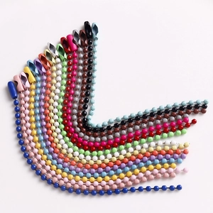 Macro shot of colorful iron bead chains with connectors for DIY jewelry making