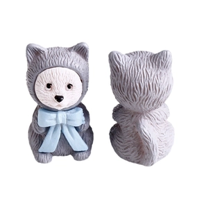 Cute cartoon cat figurine with grey hooded cloak and blue bowknot, front and back view