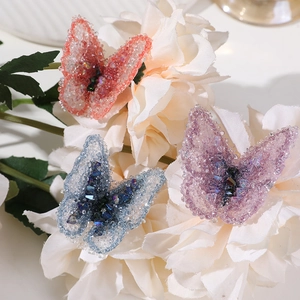 Sparkling butterfly hair accessories with crystals and beads in pink blue and purple colors