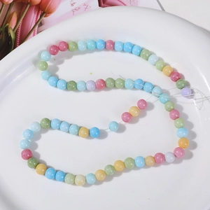 Macro detail of 8mm colorful ice cracked round beads for DIY jewelry making sets