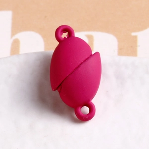 Macro shot of rose red matte magnetic clasps for DIY jewelry making accessories
