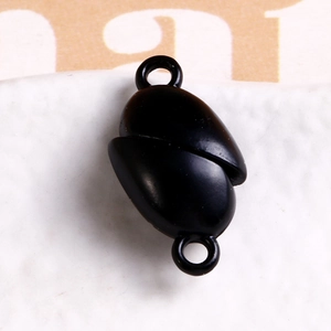 Detail of matte black magnetic clasp with double rings for DIY jewelry making
