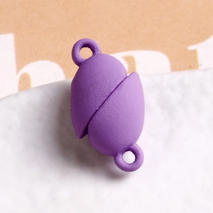 Macro view of purple matte finish magnetic lobster clasps for DIY jewelry making