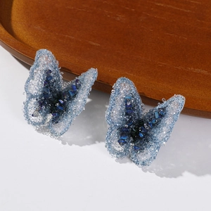 Detail of blue organza butterfly charms with sparkling beads and crystal accents