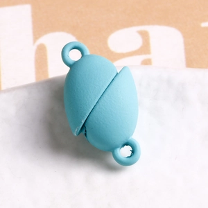 Close-up of light blue matte magnetic clasp for jewelry making and bracelet repair