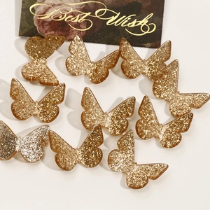 Set of 10 golden glitter butterfly charms for DIY earrings and hair accessories