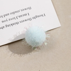 Light blue pompom with iridescent glitter strands for DIY craft and hair accessories