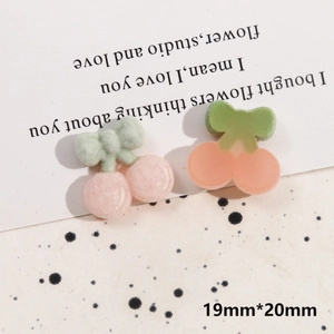 Detail view of pink velvet and resin cherry charms for DIY jewelry 19mm*20mm