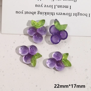 Detail of four purple resin grape charms for DIY jewelry making size 22mm by 17mm