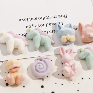 Detail of colorful flocked cartoon animal resin patches for DIY hair clip accessories
