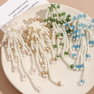 Elegant faux pearl beaded tassel earrings with floral cluster design in four pastel shades