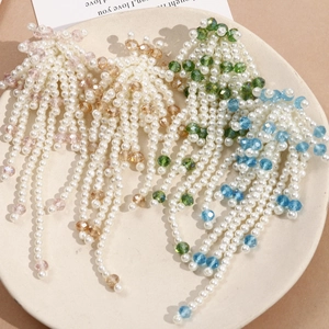 Elegant beaded tassel earrings featuring faux pearls and colorful crystal flower clusters