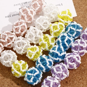 Detailed macro view of colorful handmade crystal beaded balls for DIY jewelry making