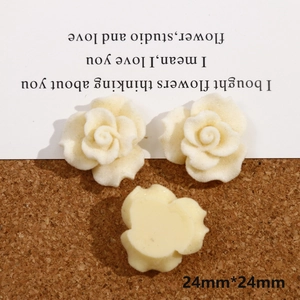 Detail of 24mm cream flocked rose resin charms with flat back for DIY jewelry making