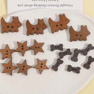 Detailed view of dog, star and bone shaped wooden 2-hole buttons for DIY crafts