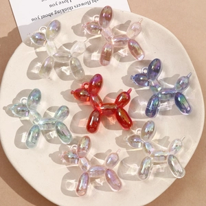 Detailed set of 7 vibrant acrylic balloon dog pendants in assorted iridescent colors