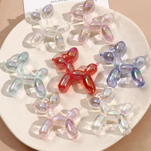 Set of seven colorful 3D acrylic balloon dog pendants with vibrant gradient aurora finish