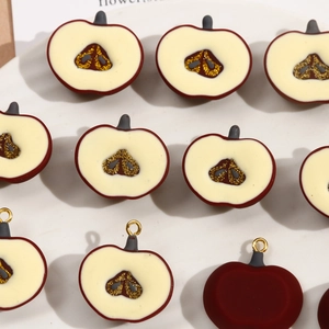 Dark red resin apple slice pendants with heart-shaped glitter core for DIY jewelry making