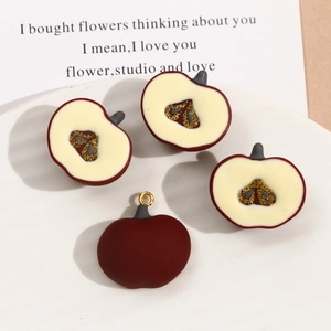 Deep red resin apple pendant charm with heart-shaped golden glitter center for DIY jewelry