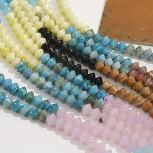 Macro view of multi-colored faceted 8mm natural stone beads for DIY jewelry making