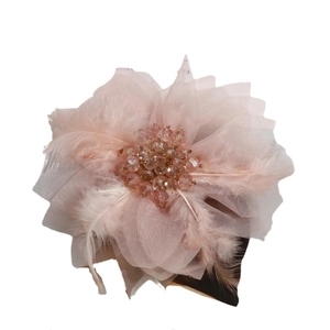Pink feather and mesh flower hair accessory with crystals for elegant gown styling