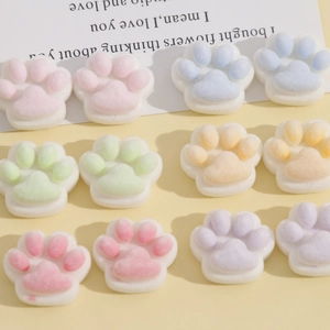 Detail shot of mini colorful flocked resin cat paw charms for DIY crafts and accessories