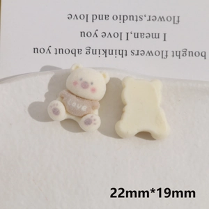 Macro detail of flocked bear DIY charm showing the front and back view with dimensions