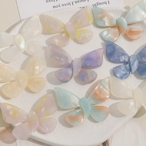 Pastel butterfly acetate charms set in cream and gradient colors for DIY hair accessories