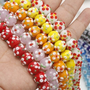 Colorful Millefiori glass beads for DIY jewelry making featuring round floral patterns