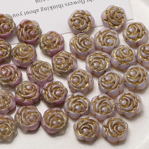 Macro detail of lavender glass rose beads with gold edges for DIY jewelry making