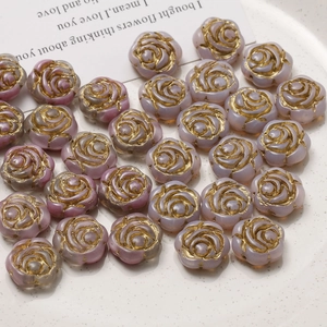 Detailed view of light purple gradient rose glass beads with gold edges for jewelry making