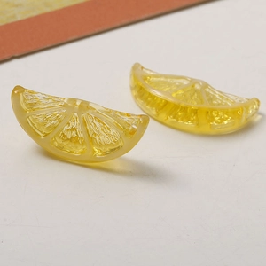 Detailed close-up of translucent yellow resin lemon slices with realistic fruit texture