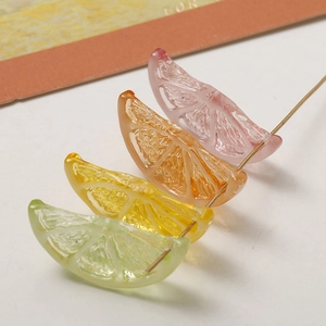 Macro view of colorful translucent resin fruit slices with fine pulp texture detail