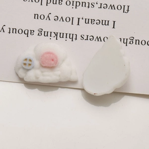 Front and back view of white flocked cloud resin charms for DIY handmade jewelry