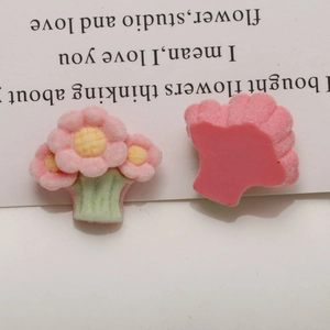 Detailed view of pink flocked flower resin charms for DIY handmade jewelry crafts