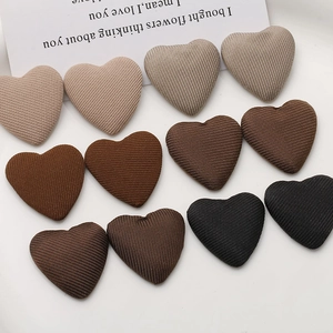Set of 12 heart-shaped corduroy fabric patches in earth tones for DIY hair accessories