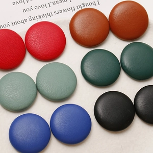Minimalist round leather buttons with lychee grain texture in various colors for DIY hair accessories